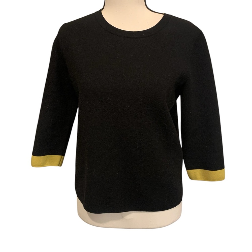 D. Exterior | Black and Gold wool blend sweater